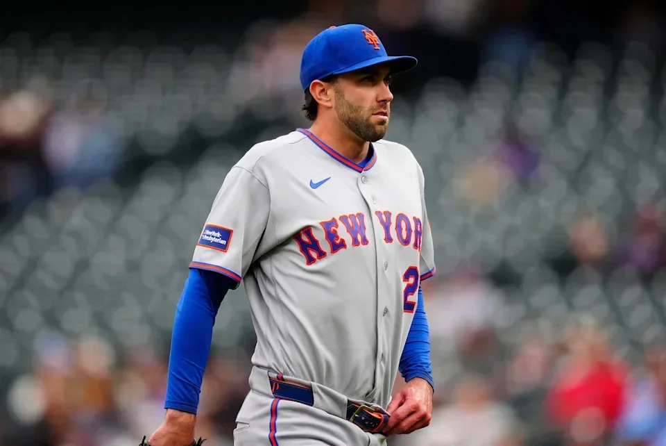 New York Mets relief pitcher David Peterson (23) leaves the mound in the fifth inning against the Colorado Rockies on May 4, 2026, at Coors Field.