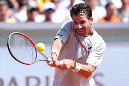 Cameron Norrie plays a backhand against Thiago Agustín Tirante